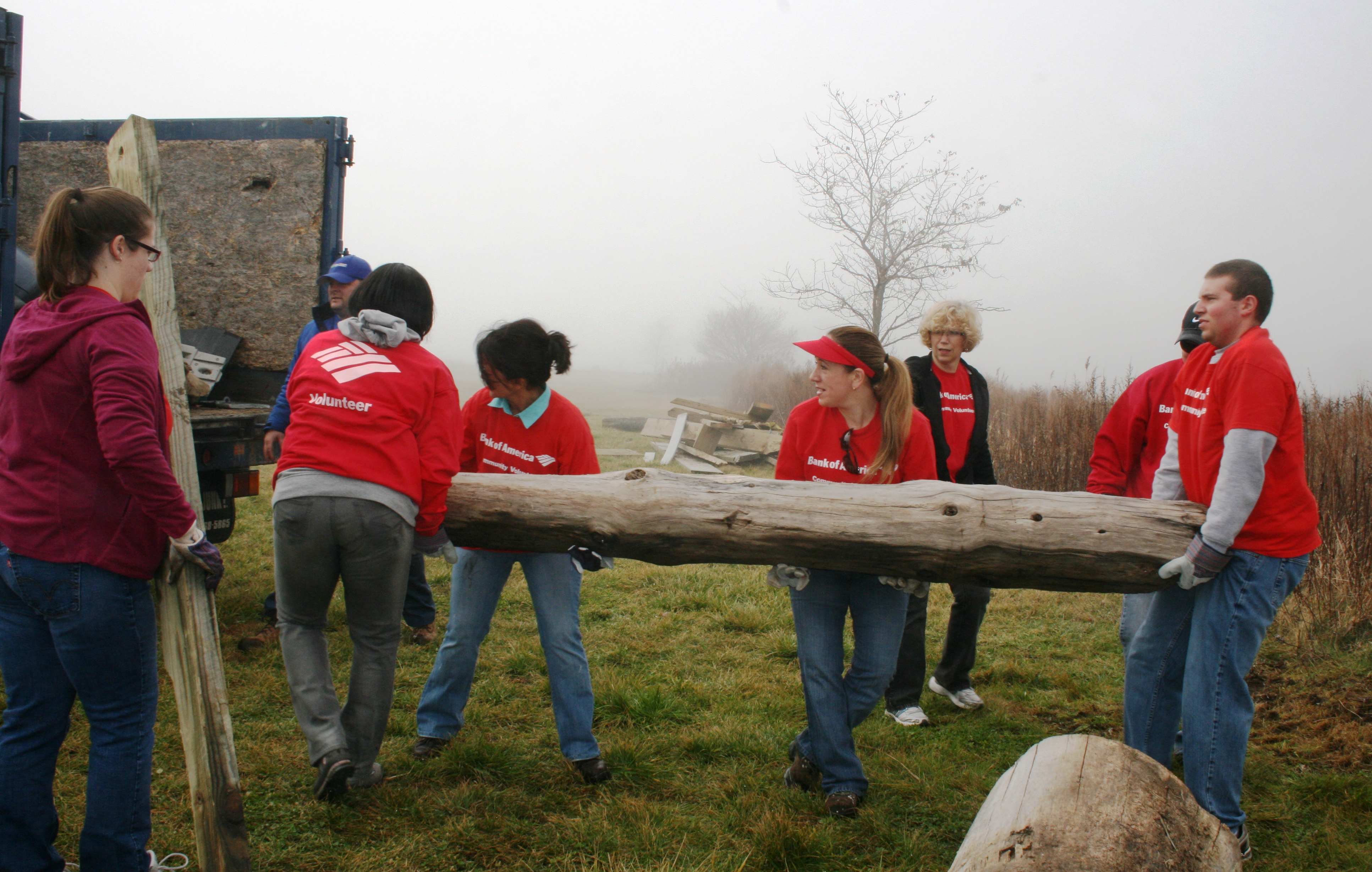 Bank of America volunteers removing debris from Silver Sands after Hurricane Sandy