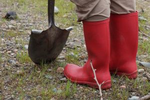 red boots and a shovel, representing our toolbox